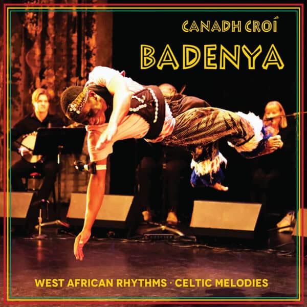 Male dancer in Guinean clothing leaping in air in front of three musicians. The band name, Canadh Croi, and album, Badenya, are above him, and description WEST AFRICAN RHYTHMS - CELTIC MELODIES is below